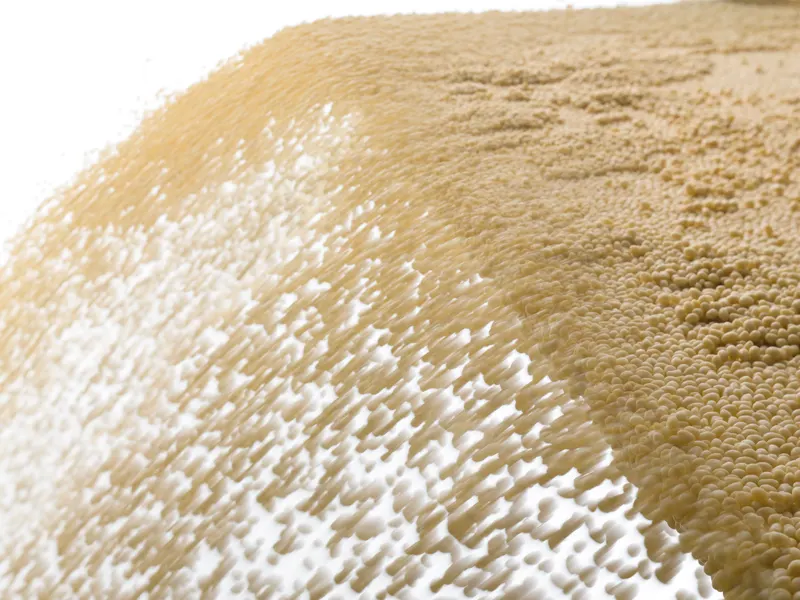 Urea-formaldehyde adhesive powder